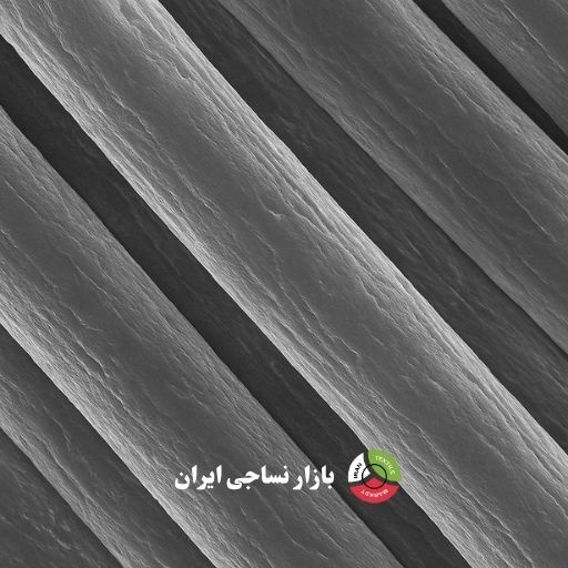 سطح مقطع الیاف اکریلیک در بزرگنمایی بالا نمای میکروسکوپی سطح الیاف اکریلیک